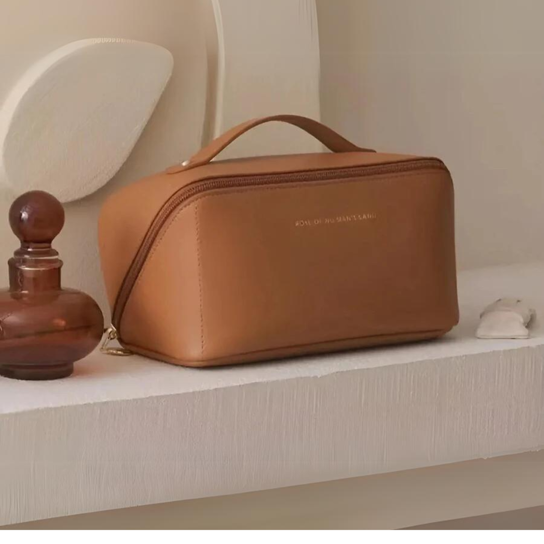 Compact and stylish women's waterproof cosmetic bag, essential for organized makeup storage during travel.