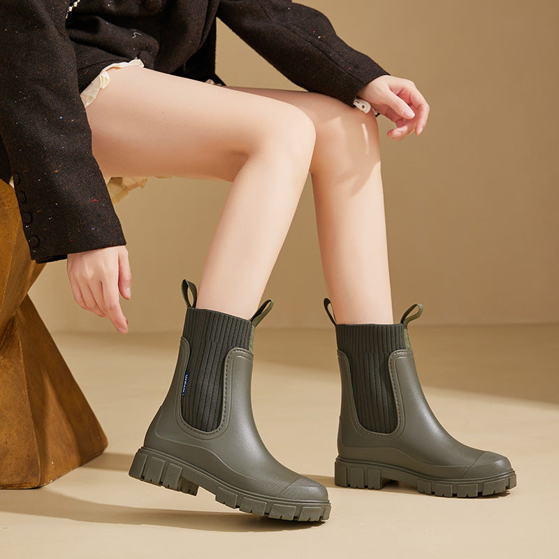 Stylish women's waterproof rain boots, perfect for all-weather outdoor adventures. Durable and comfortable footwear.