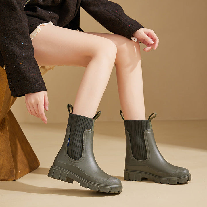 Stylish women's waterproof rain boots, perfect for all-weather outdoor adventures. Durable and comfortable footwear.