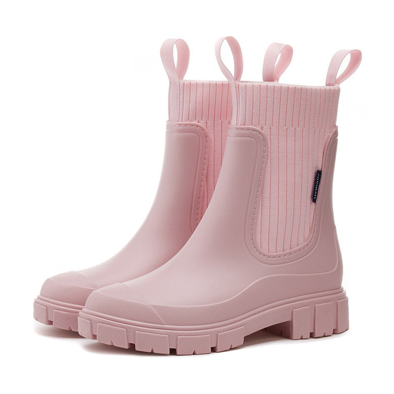 Sleek women's waterproof rain boots, offering all-weather protection and lasting comfort. Essential durable footwear.