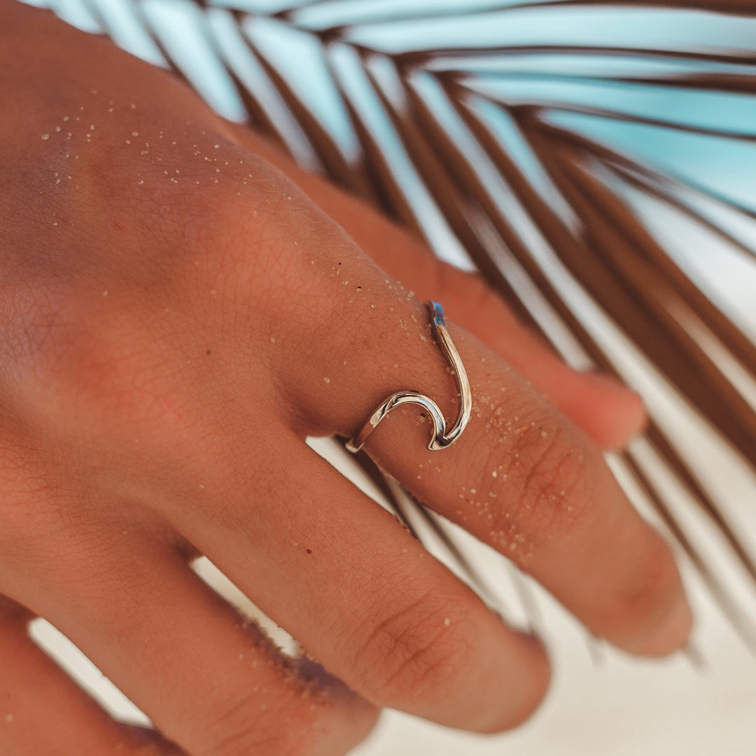Stylish women's wavy wave ring in silver, adjustable for everyday wear. Ocean-inspired hypoallergenic jewelry.