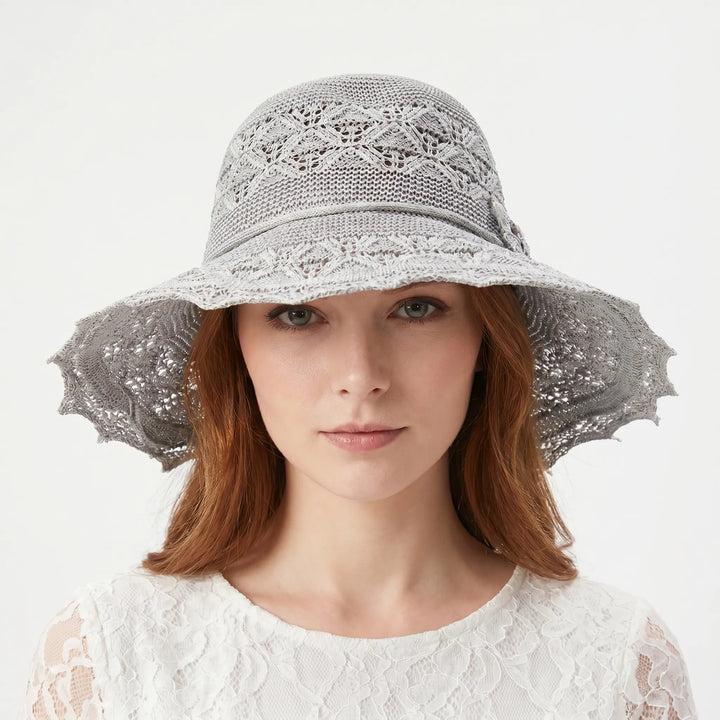 Foldable wide brim sun hat for women, offering excellent shade & UV protection for beach or travel.