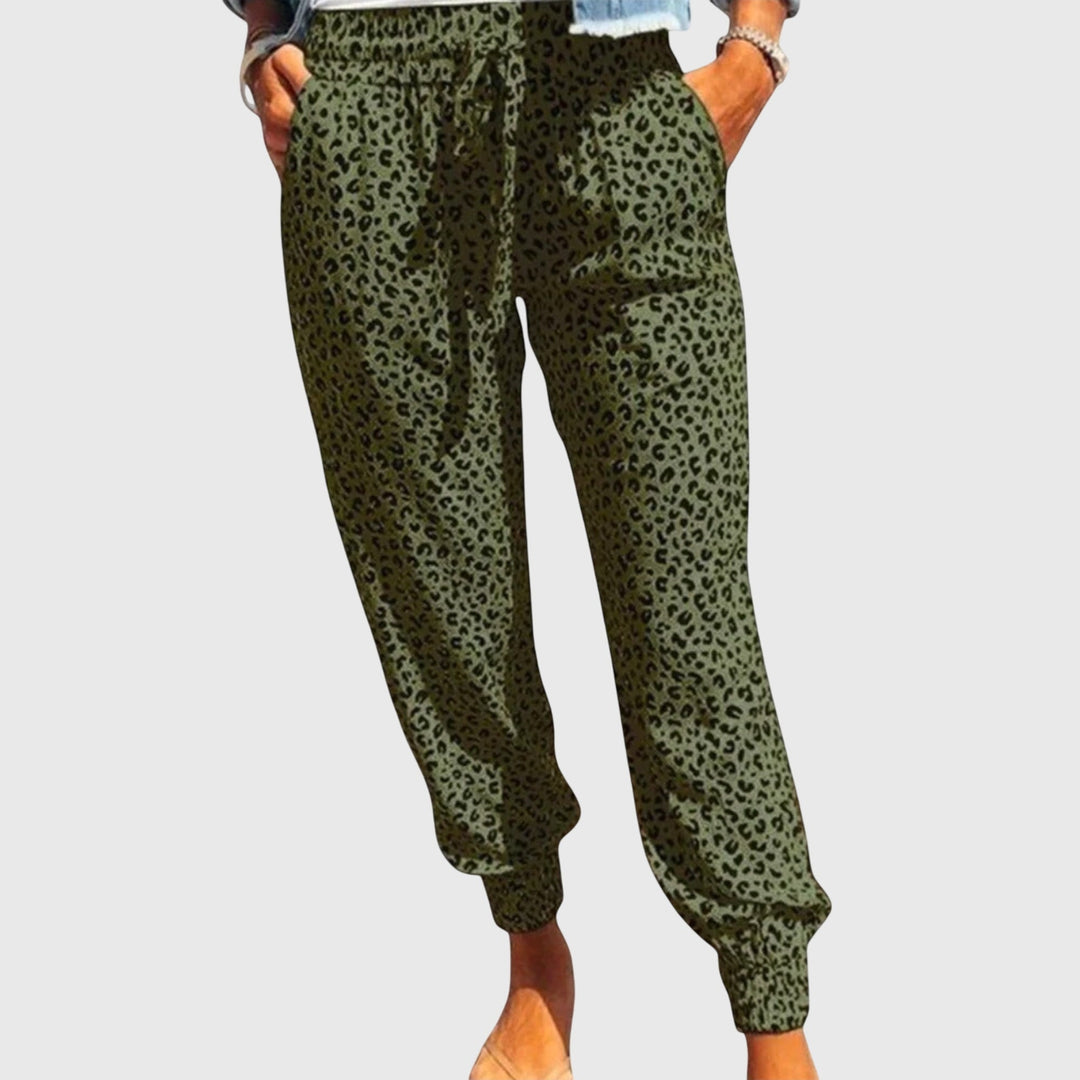 Stylish women's wide leg pants with a trendy wild animal print, perfect for a bold fashion statement.