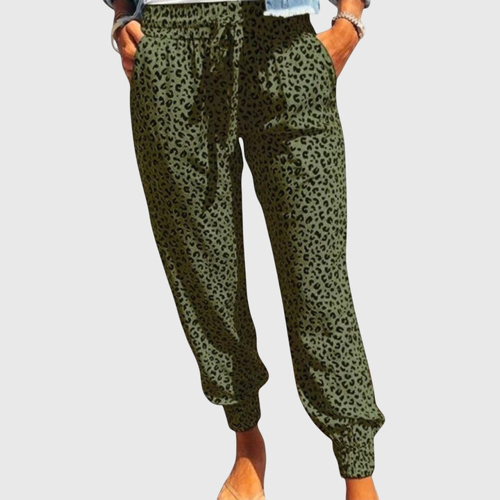 Stylish women's wide leg pants with a trendy wild animal print, perfect for a bold fashion statement.