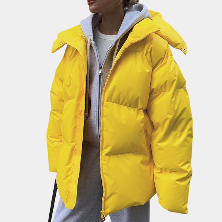 Ladies weatherproof jacket, a chic windbreaker, perfect for transitional seasons and active outdoor activities.