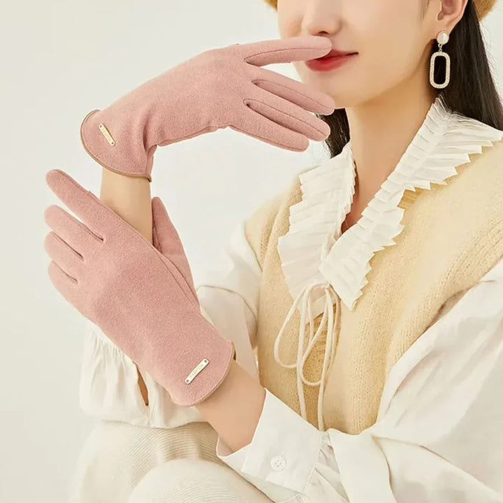 Practical women's warm gloves for winter, with conductive fingertips for touchscreen phones.