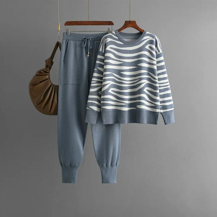 Versatile women's zebra print two-piece loungewear set. Stylish & comfortable for casual wear or home.