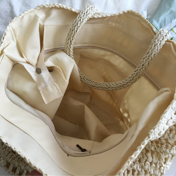 Stylish woven tote bag for women, perfect as a summer beach or everyday fashion accessory.