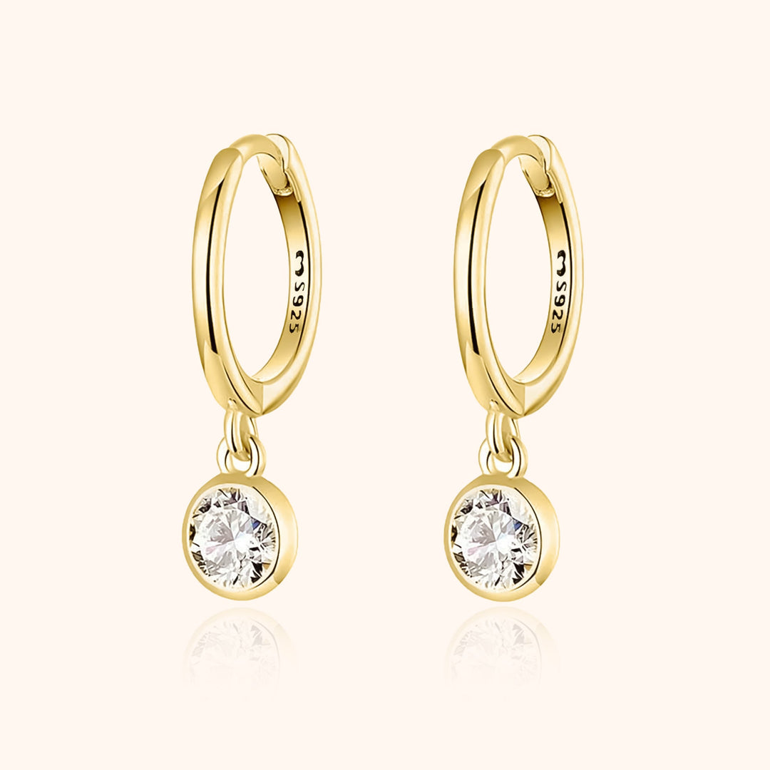 Elegant women's gold plated & sterling silver hoops. Subtle and stylish earrings for a touch of everyday luxury.