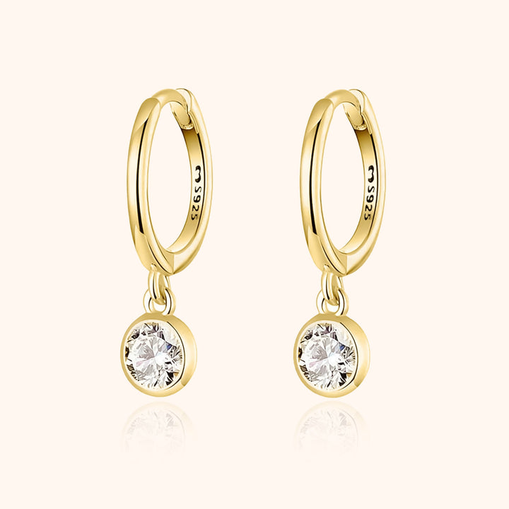 Elegant women's gold plated & sterling silver hoops. Subtle and stylish earrings for a touch of everyday luxury.