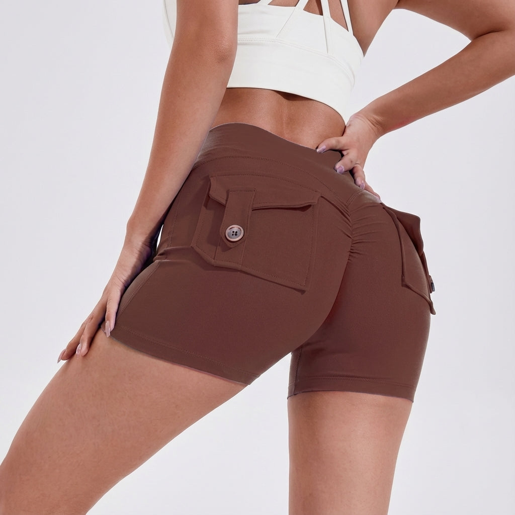 Women's athletic high-waisted shorts with side pockets, perfect for running, in a vibrant blue color.