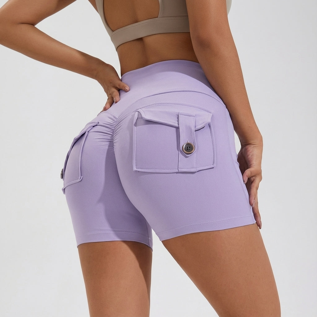 Front view of black high-waisted sports shorts for women, featuring convenient pockets and a comfortable design.