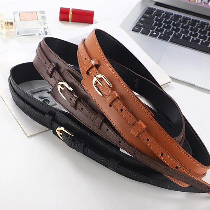 Trendy tan women's dual-strap vegan leather belt, an adjustable accessory for various outfits.