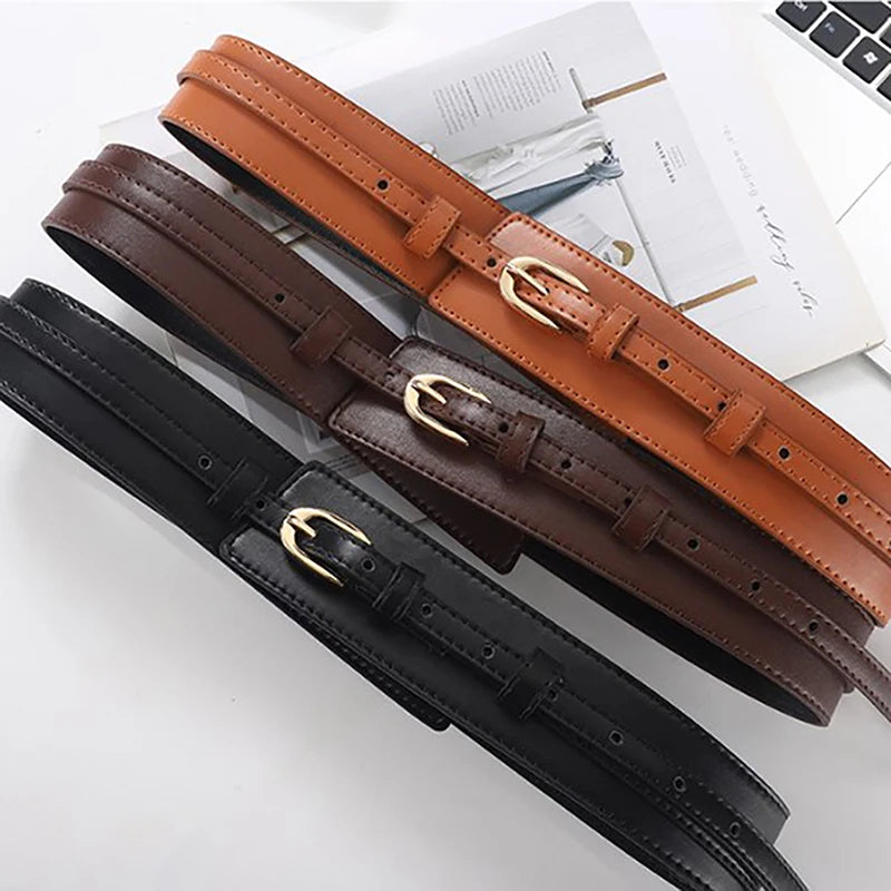 Versatile brown women's adjustable dual-strap vegan leather belt, ideal for waist styling.
