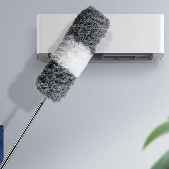 Extendable duster with long handle for high reach cleaning, cobweb removal, and fan dusting in homes.