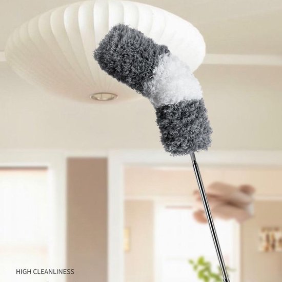Compact telescoping duster for easy storage, ready for high reach home cleaning tasks on shelves.