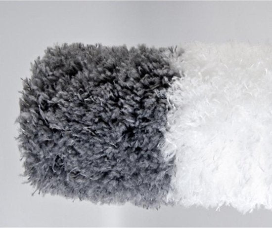 Flexible microfiber duster head on an extendable pole, perfect for intricate high reach cleaning spots.