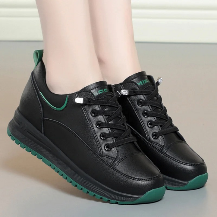 Comfortable TerraShield women's fire-resistant work shoes, waterproof for safety & protection in tough outdoor conditions.