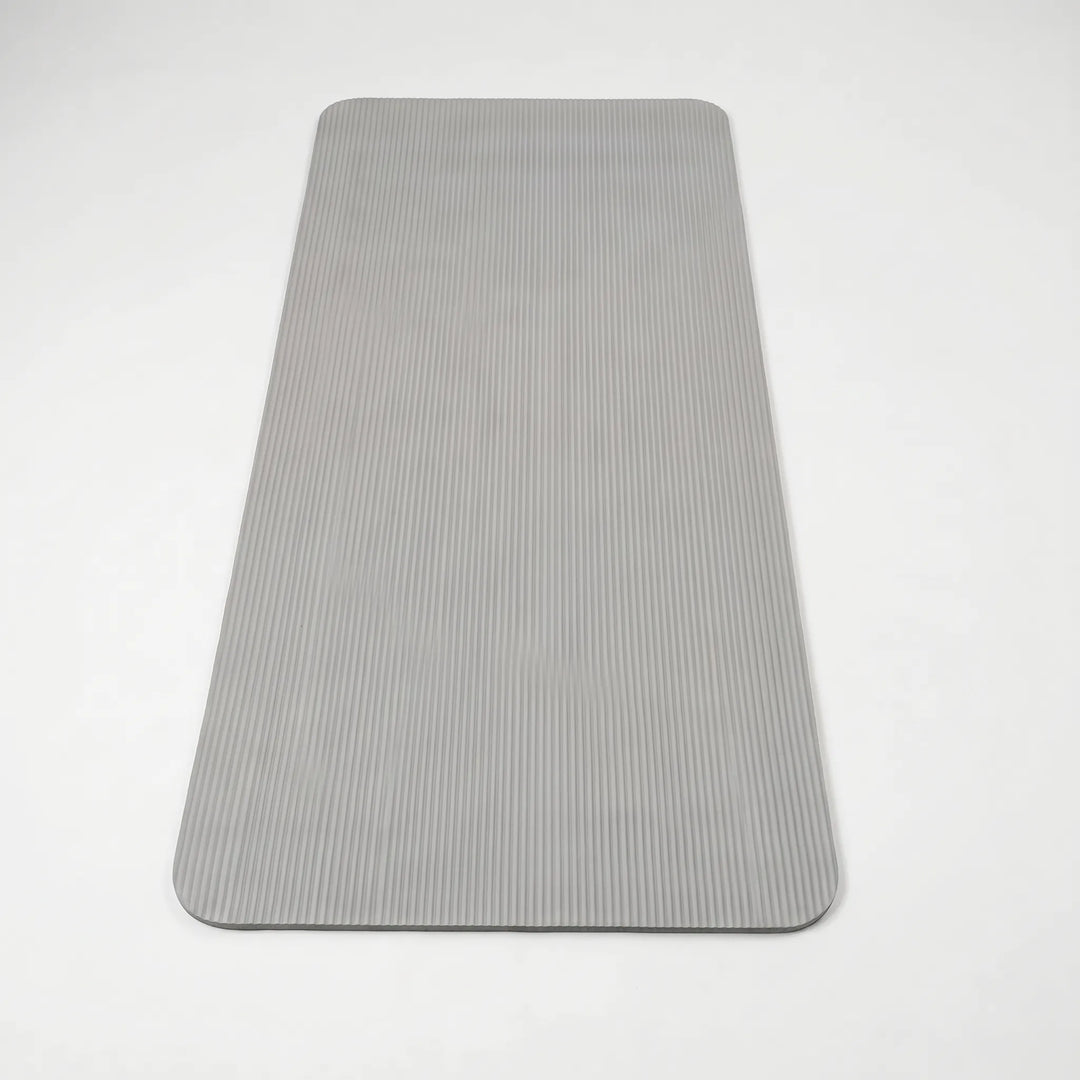 Unisex thick yoga mat, perfect for Pilates & home gym workouts. Provides superior joint protection & non-slip grip.