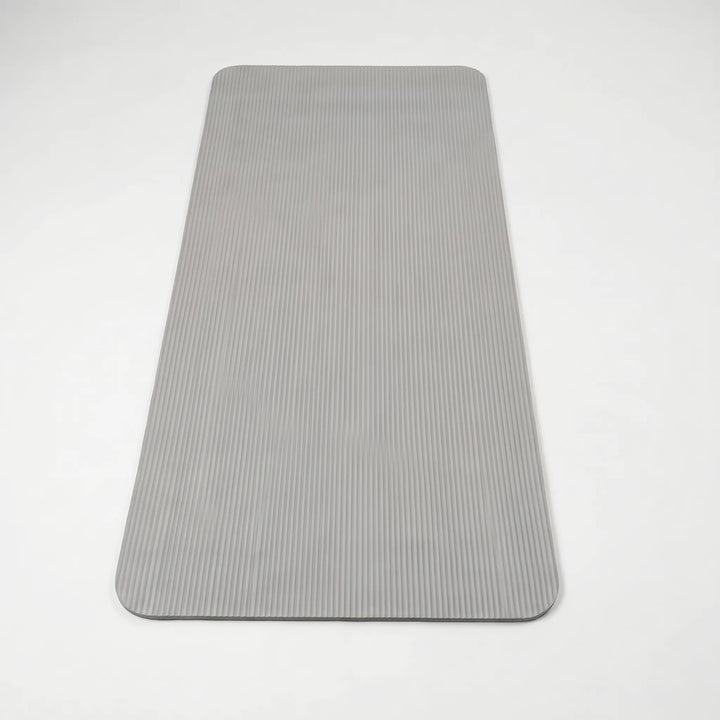 Unisex thick yoga mat, perfect for Pilates & home gym workouts. Provides superior joint protection & non-slip grip.
