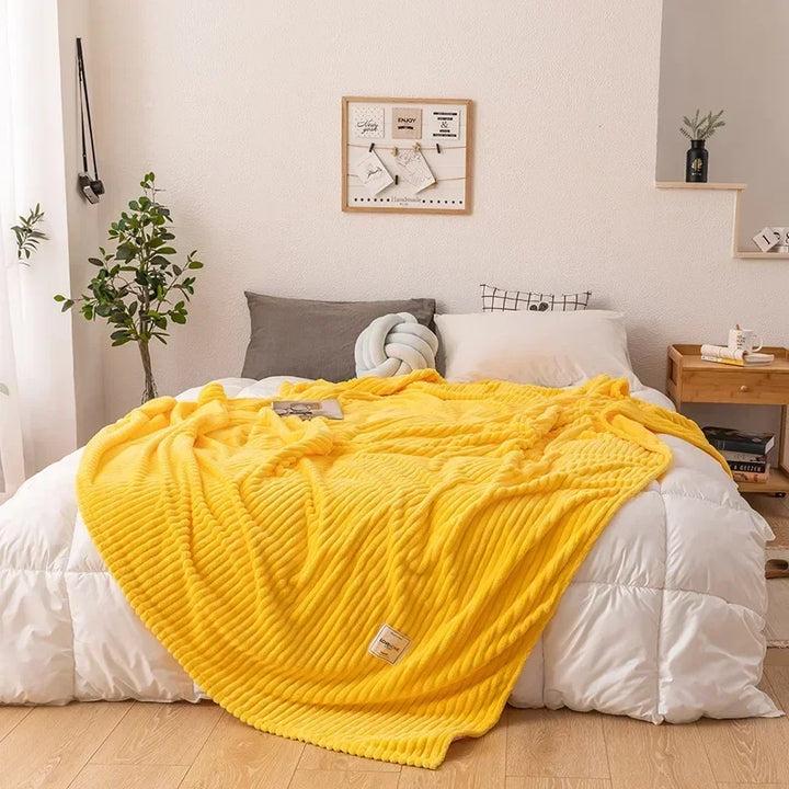 Autumn-themed flannel blanket, ideal for adding decorative warmth to any bedroom.