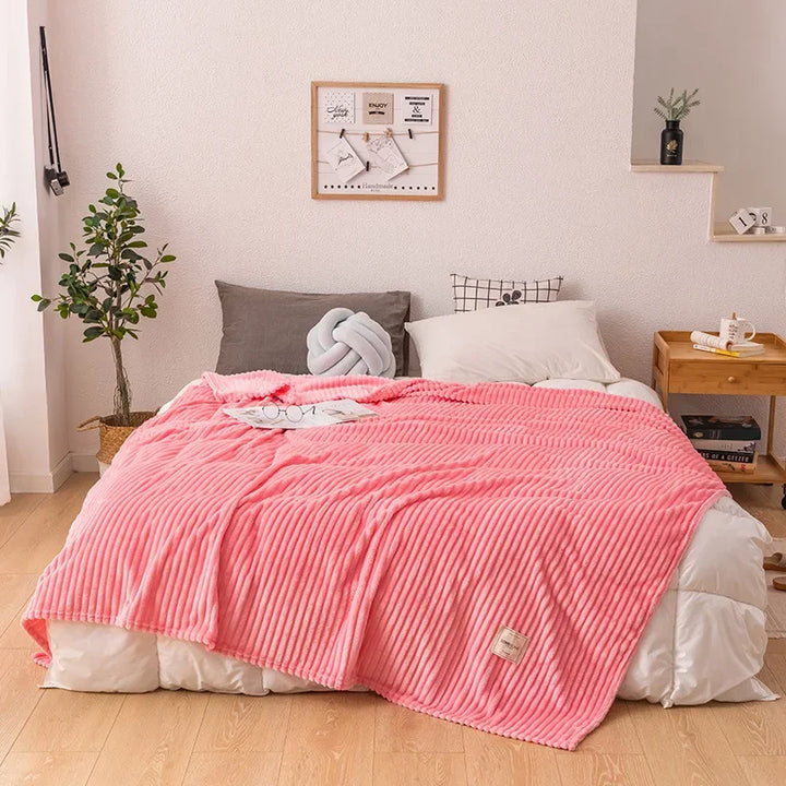 Warm flannel blanket with rich fall colors, a comfortable winter essential for home.