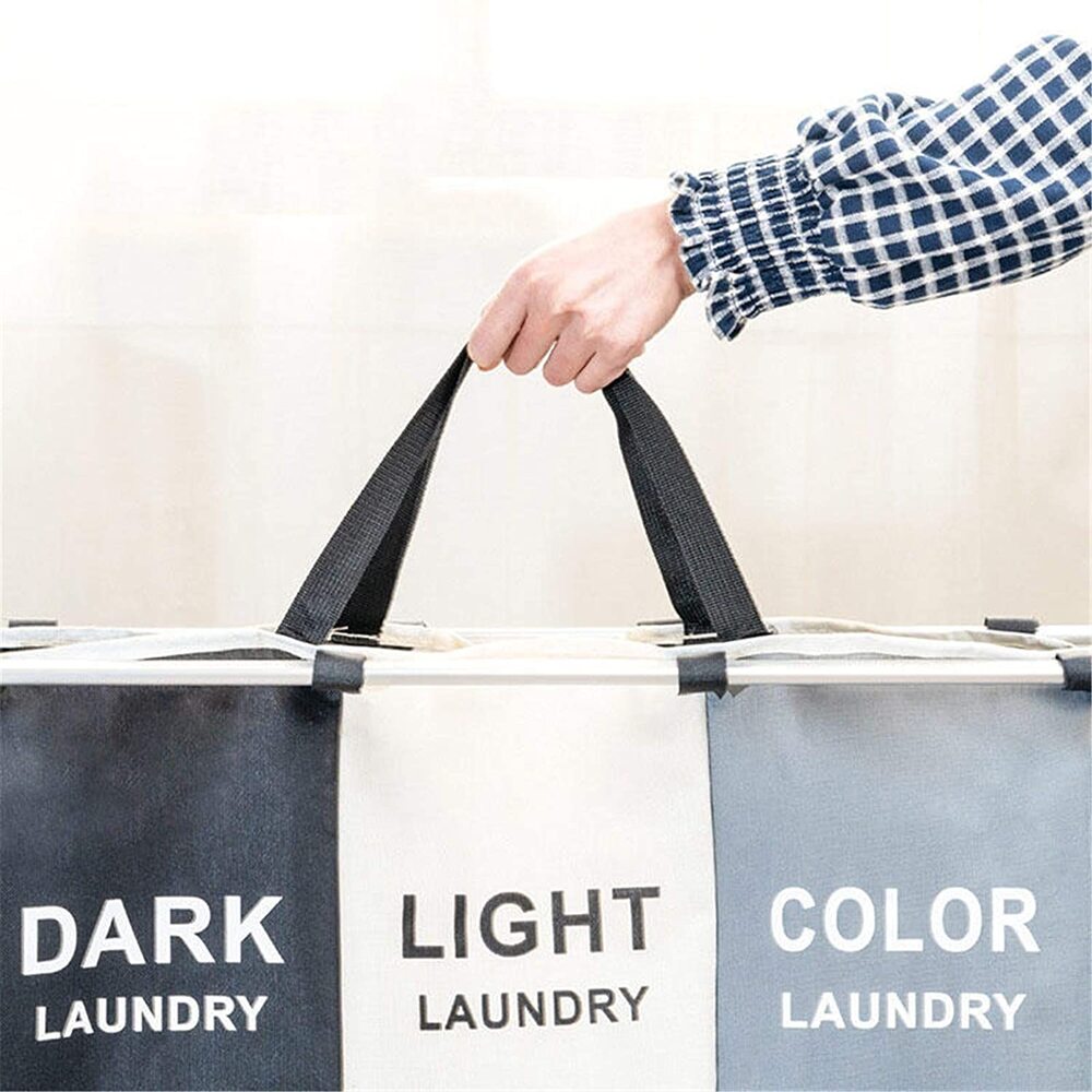 Laundry basket with three compartments, ideal for presorting clothes, a modern home organization item.