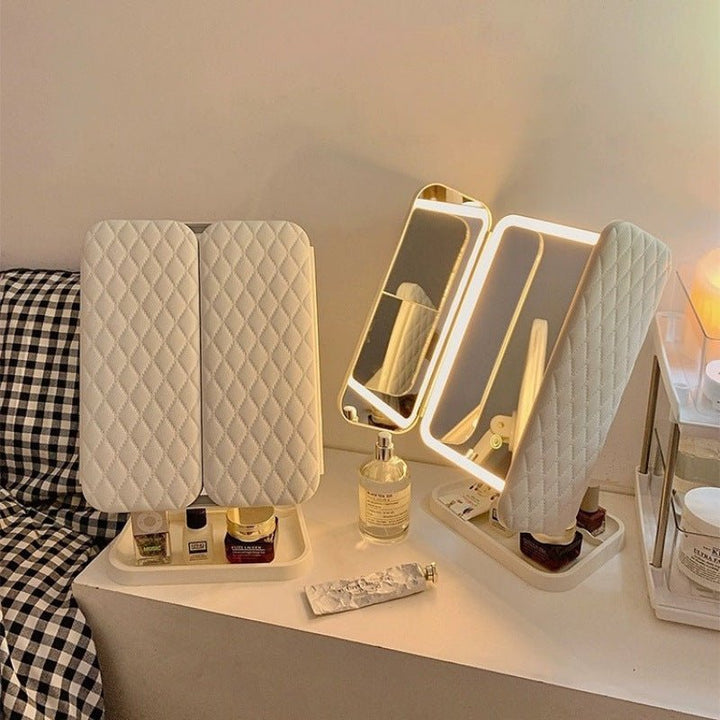 Flawless makeup application using this tri-fold LED beauty mirror, adjustable for any look.