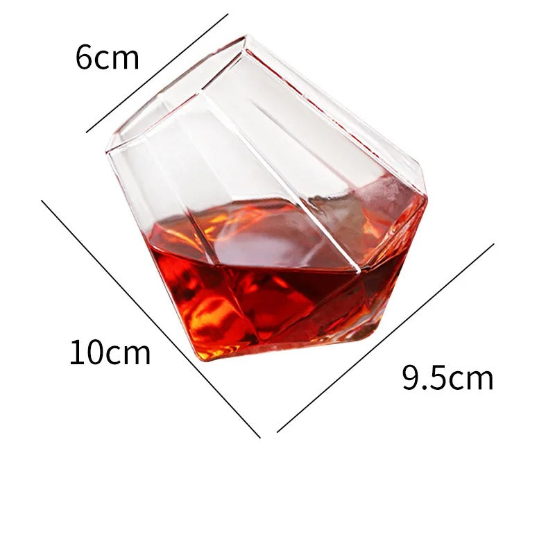 Luxury tilted crystal whiskey glass, modern barware, enhances tasting experience, unique spirit tumbler.