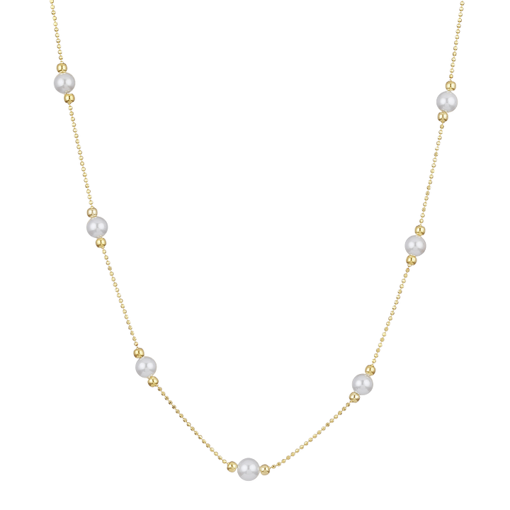 Elegant golden necklace featuring lustrous pearls, a chic women's jewelry piece for any occasion.