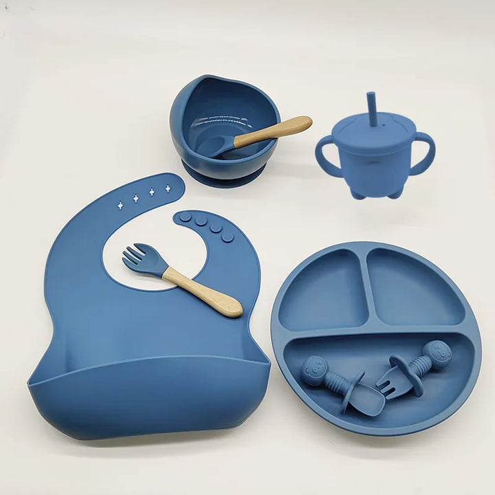 TinyBites baby silicone feeding set with suction plate & utensils for independent mealtimes.