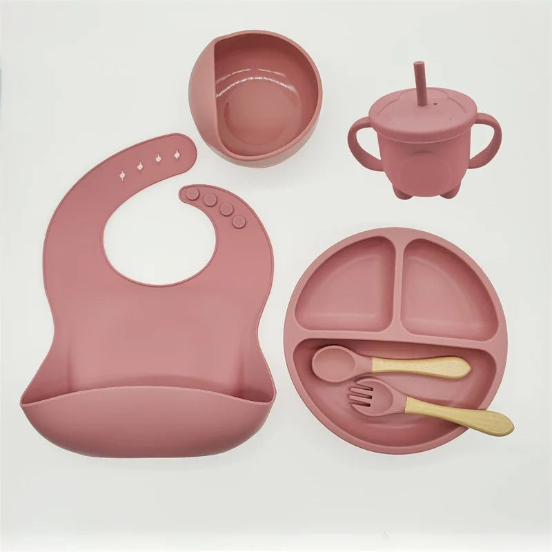 Premium silicone baby feeding set for weaning, with non-slip suction plate & soft utensils.