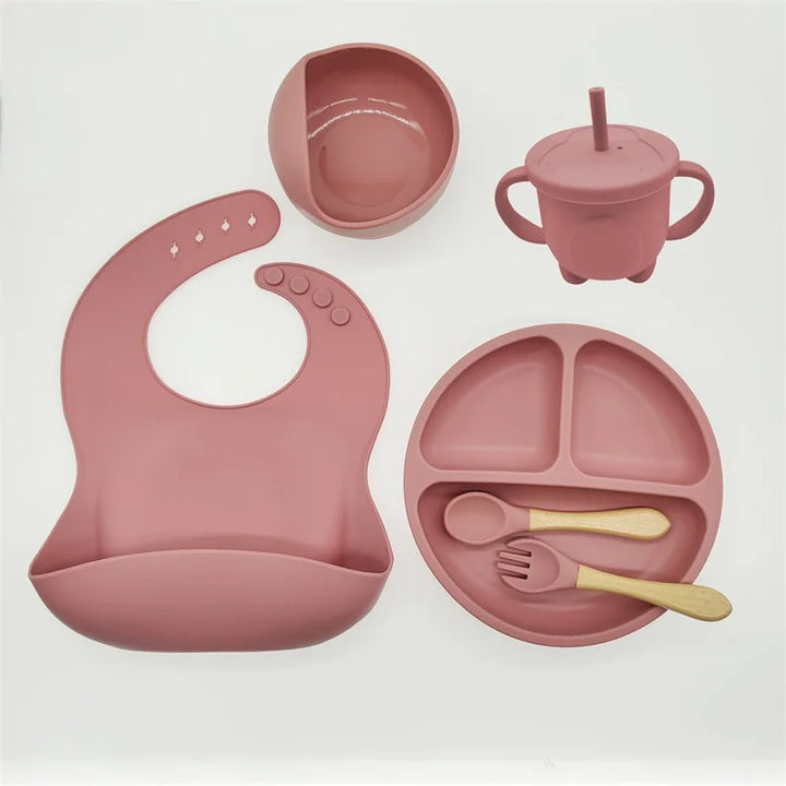 Premium silicone baby feeding set for weaning, with non-slip suction plate & soft utensils.