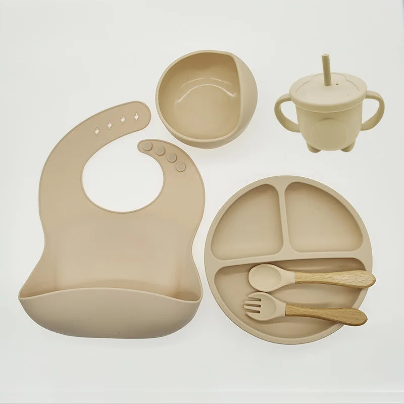 Promote independent eating with this silicone baby feeding set, suction plate & soft utensils.