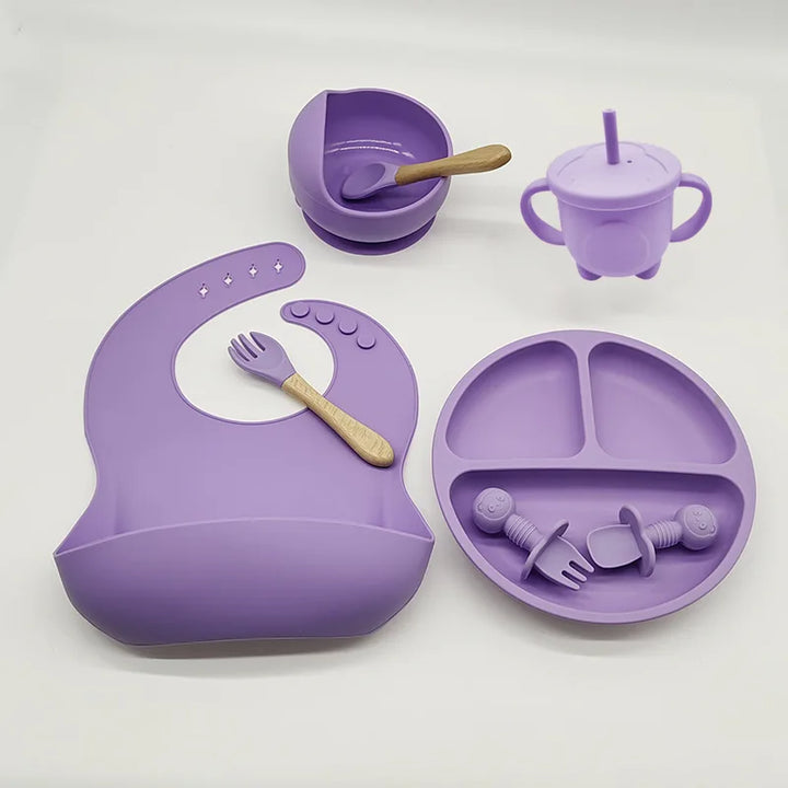 BPA-free silicone baby feeding set, non-slip suction plate & soft utensils for safe mealtimes.