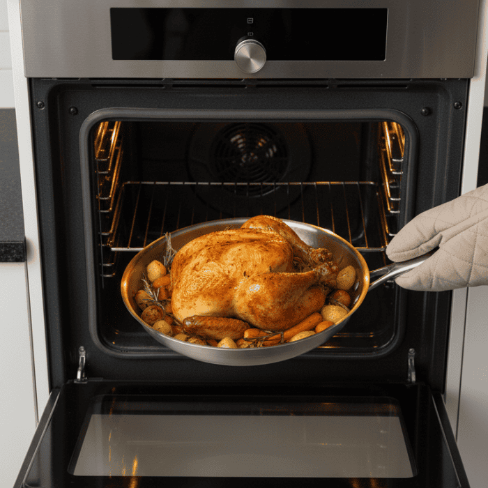TITANFORGE titanium frying pan on an induction hob, ideal for efficient & healthy cooking with its durable uncoated surface.
