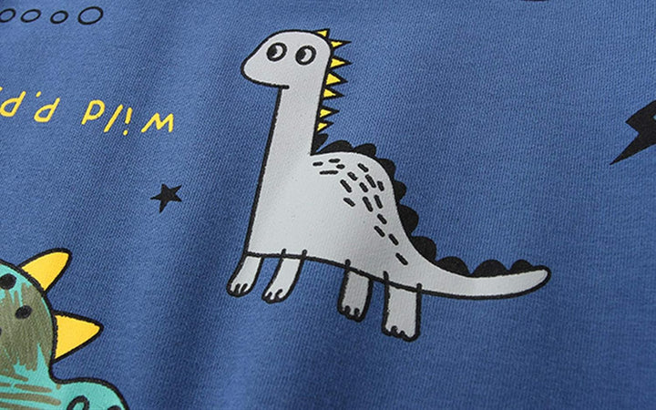 Durable blue shorts with elastic waist and fun dinosaur pattern, designed for active toddler boys.