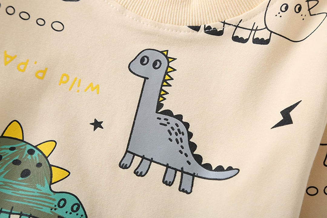 Soft cotton blend blue short sleeve top with bright dinosaur graphics for toddler boys' comfort.