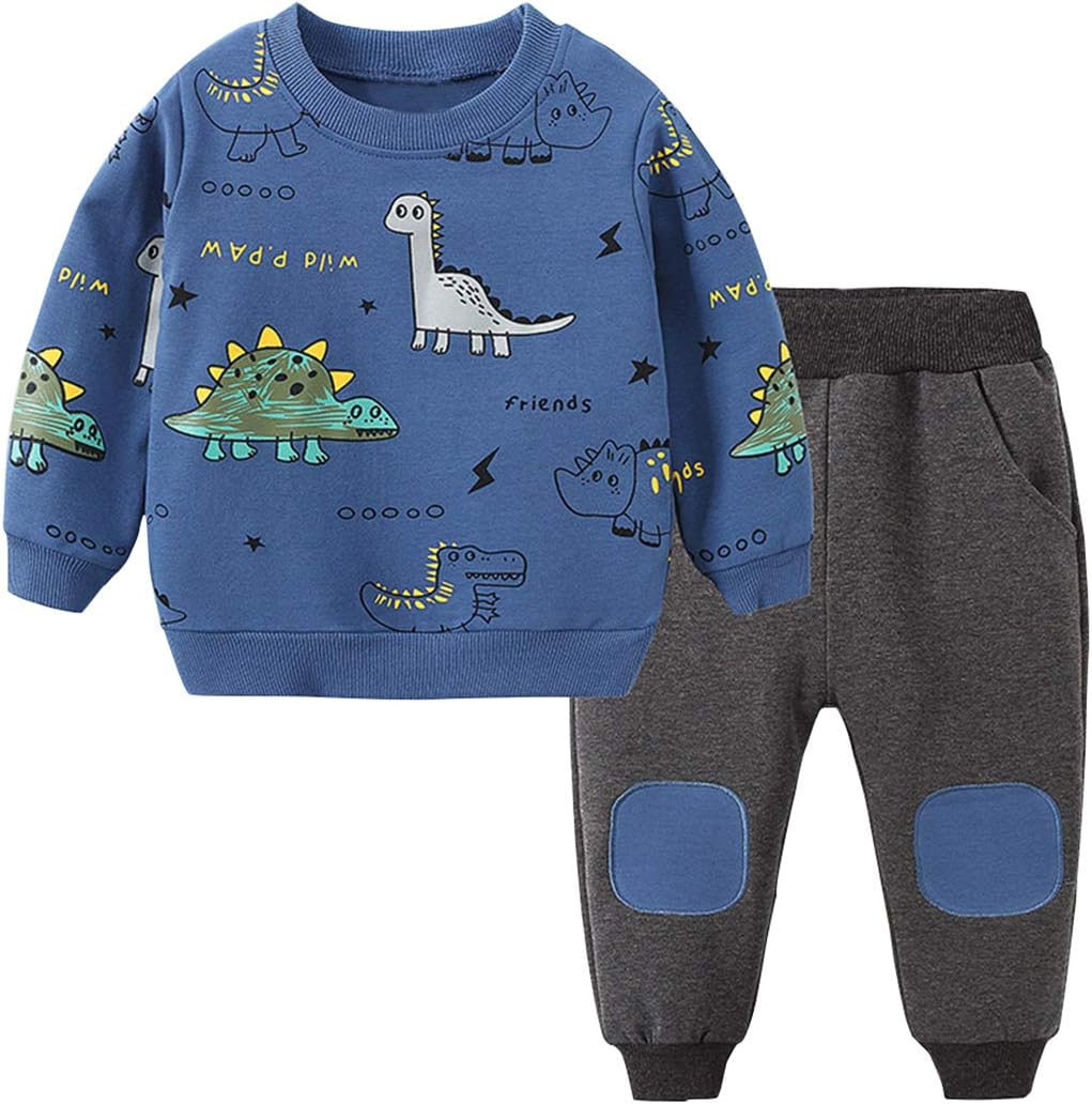 Close-up of a boy's blue cotton blend t-shirt with colorful dinosaur prints, ideal for playwear.