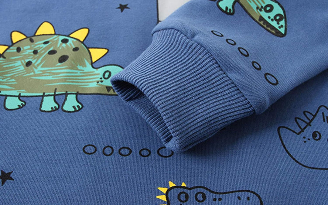Dinosaur themed boys' clothing set, blue t-shirt and shorts, perfect for young dinosaur enthusiasts.