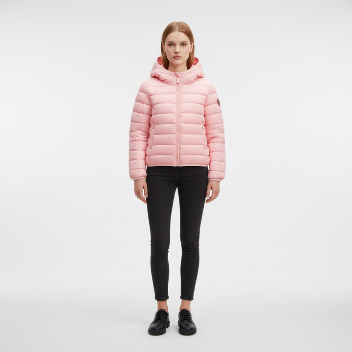 Close-up of the waterproof fabric and soft, warm lining of a cartoon kids puffer jacket.