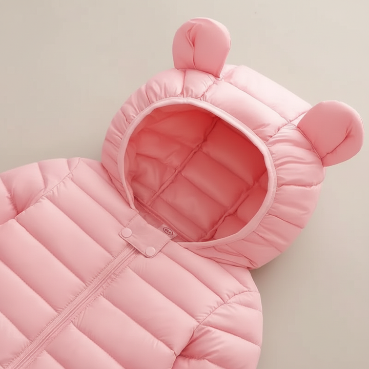 Children's outerwear: a yellow waterproof puffer jacket with a cute cartoon character design for active kids.