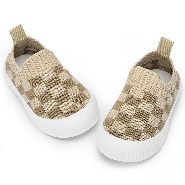 Stylish black and white checkered slip-on shoes for toddlers. Perfect kids footwear for boys & girls.