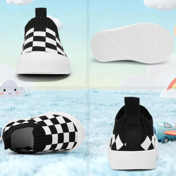 Classic black & white checkered slip-on shoes, ideal toddler footwear for casual wear and play.