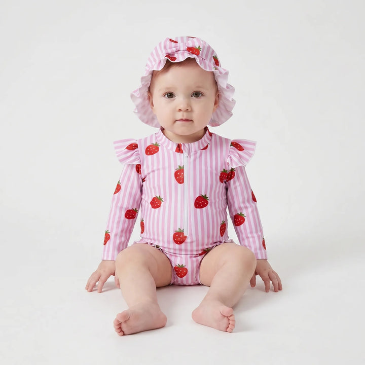 Toddler girl's easy-change long-sleeve sun protection swimsuit with a coordinating UV hat.