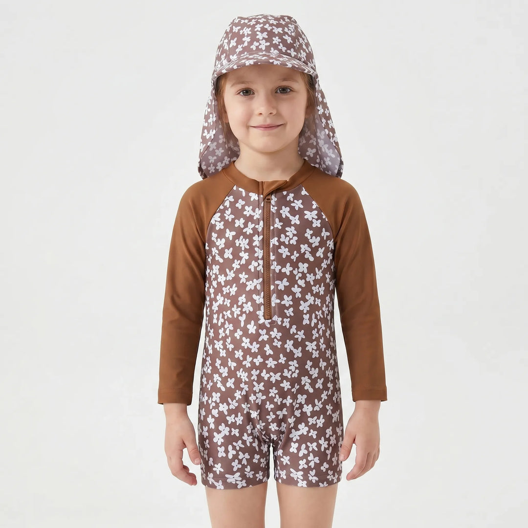Long-sleeve toddler girl's rash guard swimsuit set with sun hat, perfect floral pool wear for sun protection.