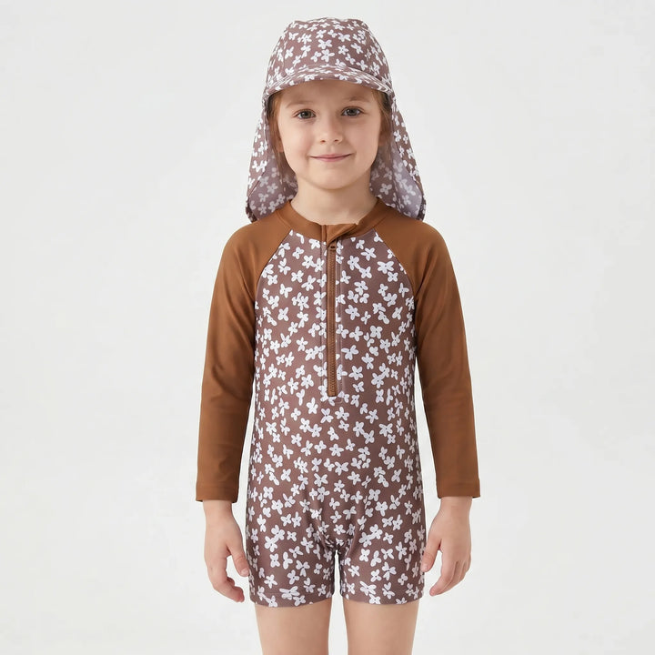 Long-sleeve toddler girl's rash guard swimsuit set with sun hat, perfect floral pool wear for sun protection.