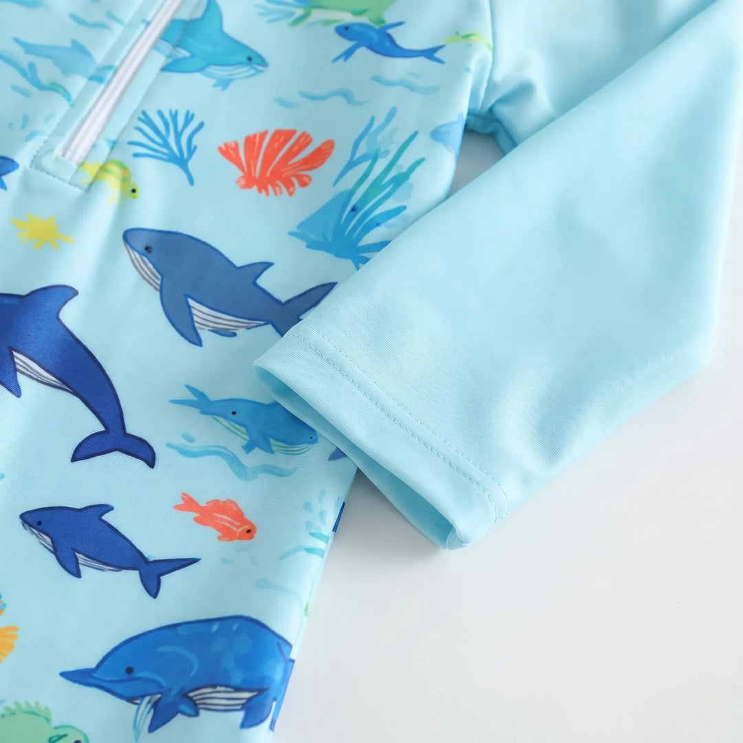 Cute marine print toddler long-sleeve swim romper with matching sun hat. Kids sunsuit for baby's UV protection.