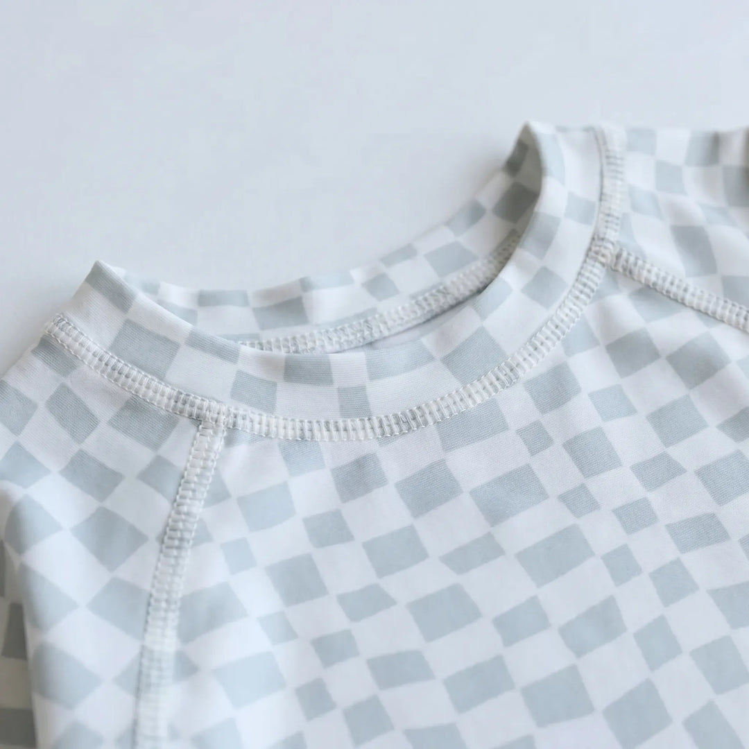 Kids beachwear: two-piece long-sleeve swimsuit set for toddlers, offering excellent UV sun protection.
