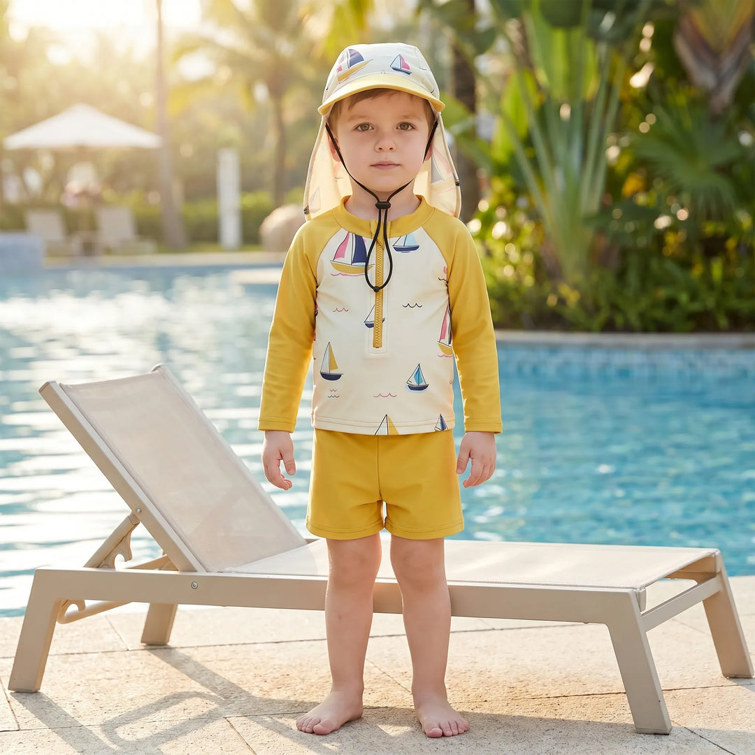 Toddler unisex three-piece swim set with long-sleeve rash guard, shorts & sun hat for ultimate UV protection.